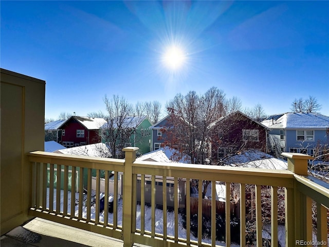 view of snow covered deck