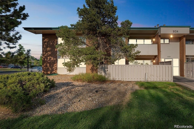 view of property exterior at dusk