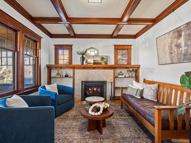 living area with a fireplace, coffered ceiling, and beam ceiling