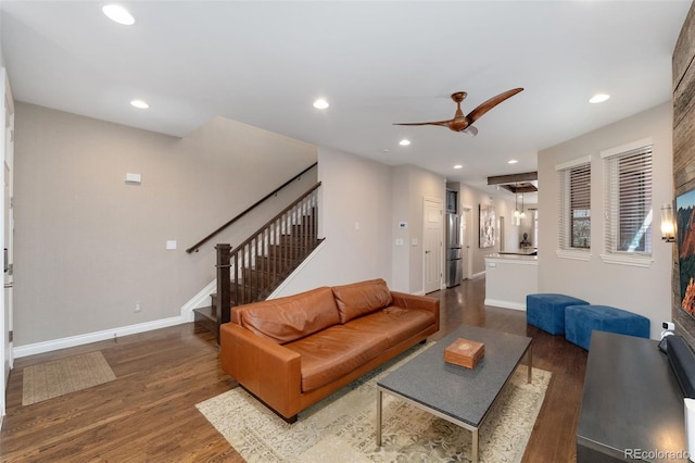 living area featuring recessed lighting, ceiling fan, wood finished floors, and stairway