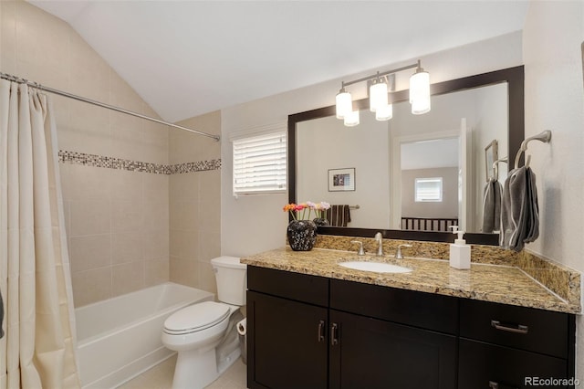 bathroom with vanity, vaulted ceiling, toilet, and shower / tub combo with curtain