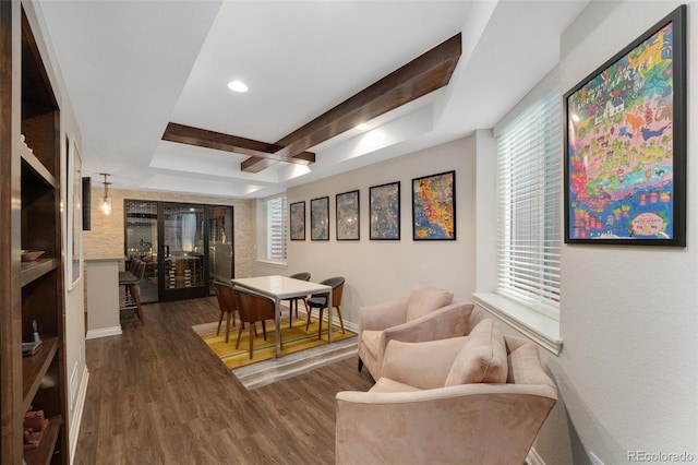 dining room featuring recessed lighting, baseboards, wood finished floors, and beam ceiling