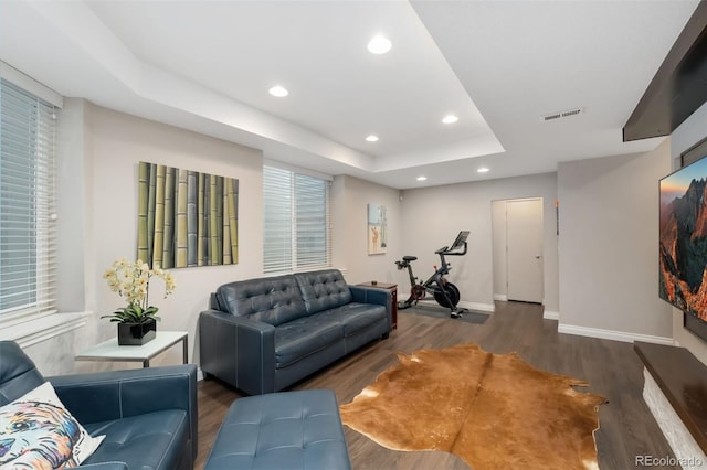 2222 N Washington St, Denver, CO 80205 - living area featuring wood finished floors, a tray ceiling, recessed lighting, and baseboards