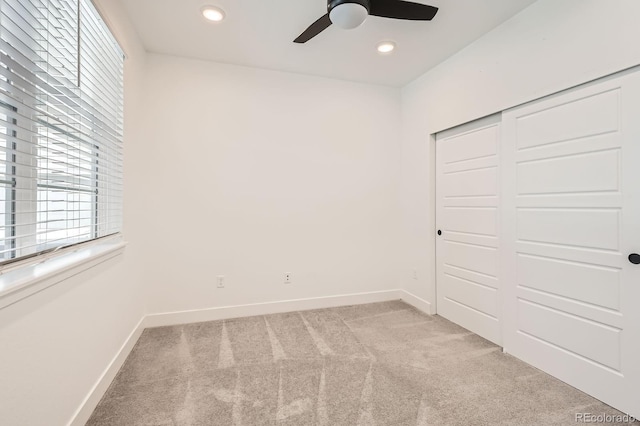 6791 Navajo Ct, Denver, CO 80221 - unfurnished bedroom featuring light carpet, baseboards, multiple windows, and recessed lighting