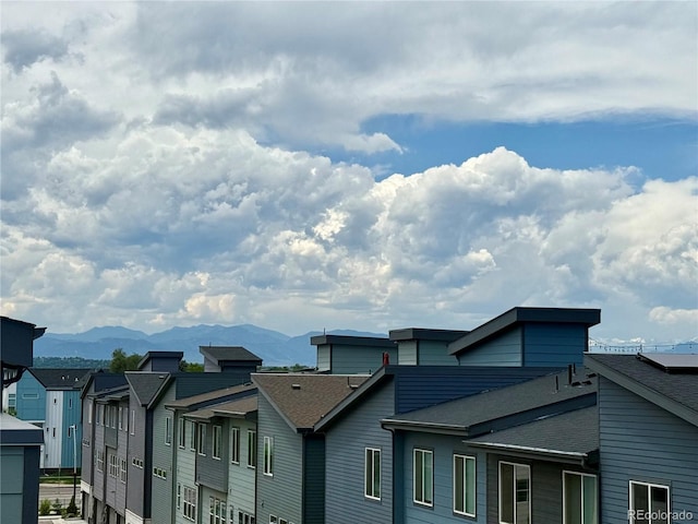 6791 Navajo Ct, Denver, CO 80221 - exterior space featuring a mountain view, roof with shingles, and a residential view