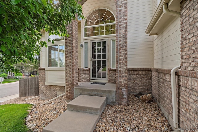 9602 Indian Wells Dr, Lone Tree, CO 80124 - doorway to property with brick siding