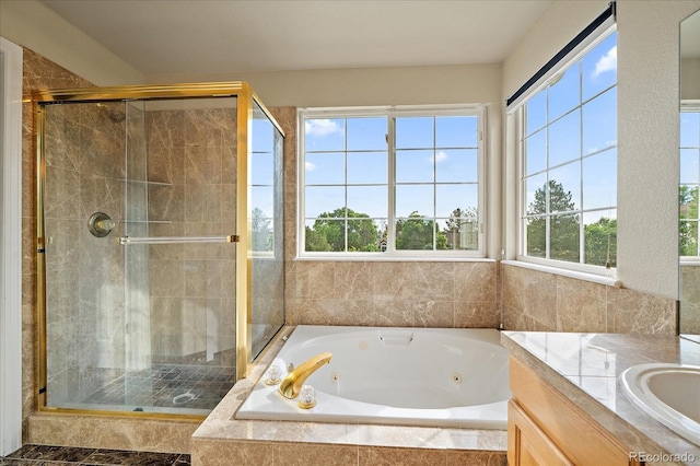 9602 Indian Wells Dr, Lone Tree, CO 80124 - full bath with a shower stall, a whirlpool tub, and healthy amount of natural light