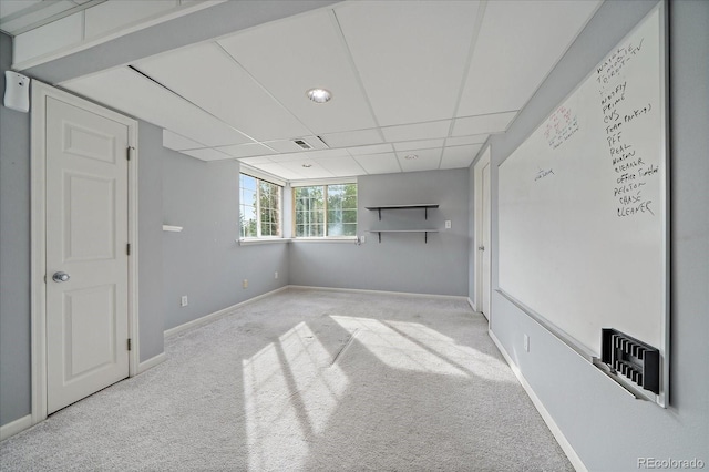 9602 Indian Wells Dr, Lone Tree, CO 80124 - unfurnished room with carpet, baseboards, and a paneled ceiling