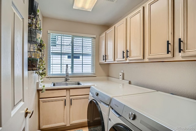 1851 S Marshall Cir, Lakewood, CO 80232 - washroom with washer and clothes dryer and cabinet space