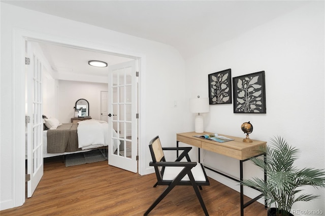 office space featuring french doors and wood finished floors