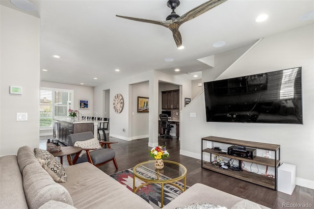 15843 E Broncos Pl, Englewood, CO 80112 - living room with wood finished floors, a ceiling fan, baseboards, and recessed lighting