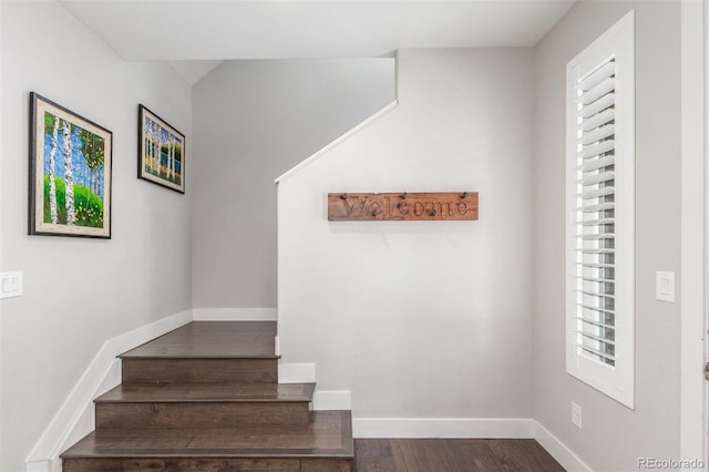 15843 E Broncos Pl, Englewood, CO 80112 - stairs with wood finished floors and baseboards