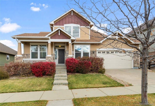 6470 S Ider St, Aurora, CO 80016 - craftsman house featuring board and batten siding, driveway, a porch, a garage, and stone siding