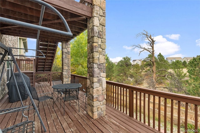 6470 S Ider St, Aurora, CO 80016 - wooden deck with outdoor dining area