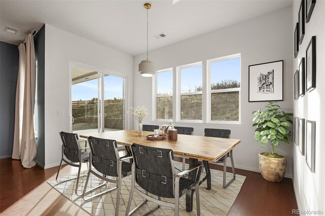 5693 Missoula Trl, Castle Rock, CO 80108 - dining area with plenty of natural light and wood finished floors