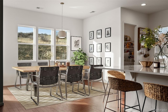 5693 Missoula Trl, Castle Rock, CO 80108 - dining space with light wood-style flooring and recessed lighting