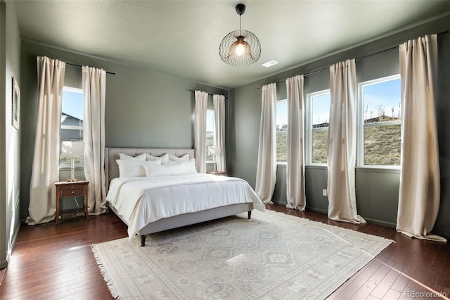 5693 Missoula Trl, Castle Rock, CO 80108 - bedroom featuring dark wood-style flooring