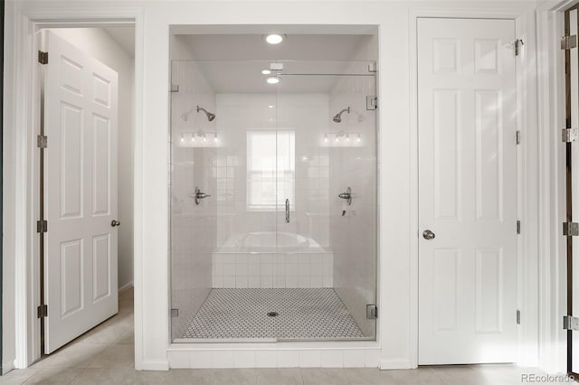 5693 Missoula Trl, Castle Rock, CO 80108 - bathroom featuring a shower stall and tile patterned floors