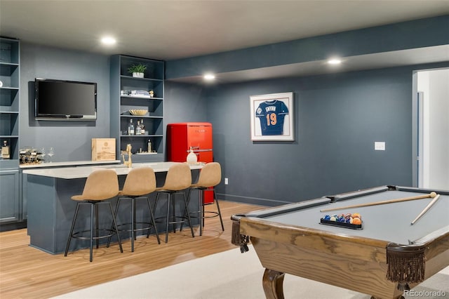 5693 Missoula Trl, Castle Rock, CO 80108 - playroom featuring light wood-style flooring, wet bar, pool table, recessed lighting, and built in features