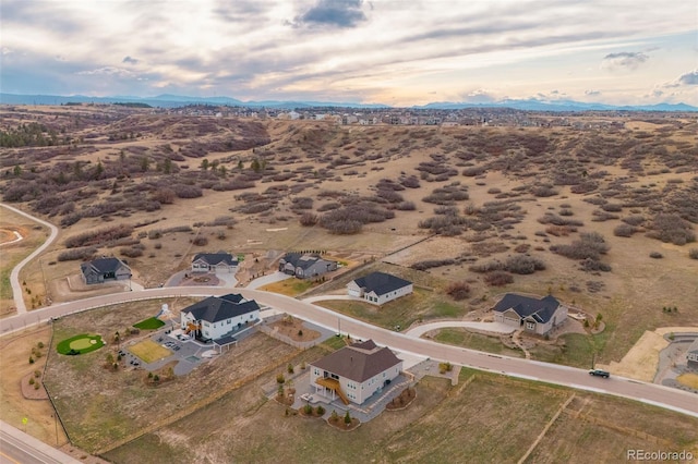 5693 Missoula Trl, Castle Rock, CO 80108 - aerial view of property and surrounding area featuring a mountain backdrop and a desert landscape