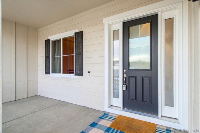 5693 Missoula Trl, Castle Rock, CO 80108 - entrance to property with board and batten siding and a porch