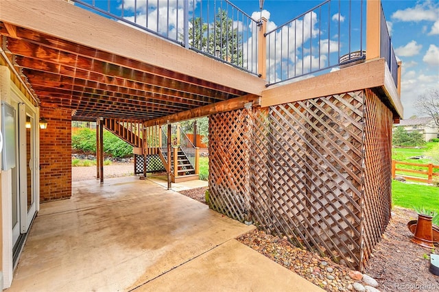 view of patio featuring stairway