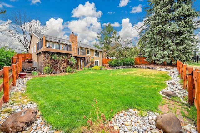 view of yard with stairs and a wooden deck