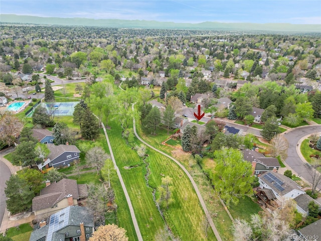 aerial view of property's location featuring nearby suburban area