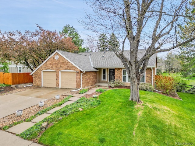 view of front of home with a garage, brick siding, driveway, and roof with shingles