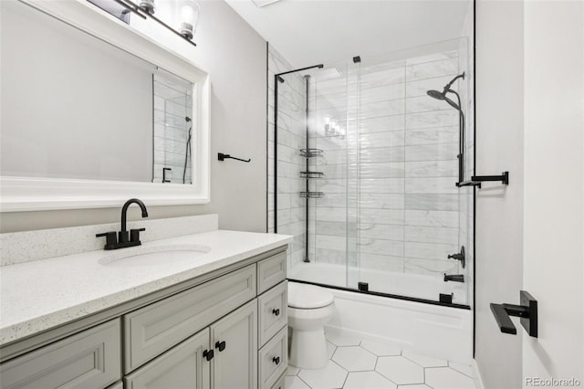 1707 Ostia Cir Unit 46, Lafayette, CO 80026 - full bath featuring vanity, enclosed tub / shower combo, and tile patterned flooring
