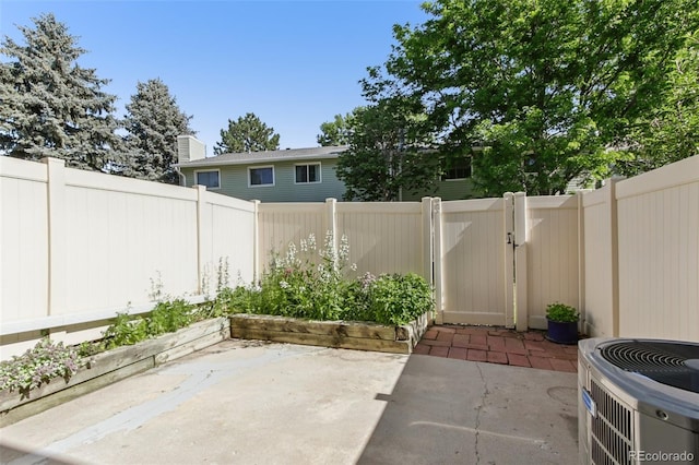 1707 Ostia Cir Unit 46, Lafayette, CO 80026 - fenced backyard featuring a patio area and a gate