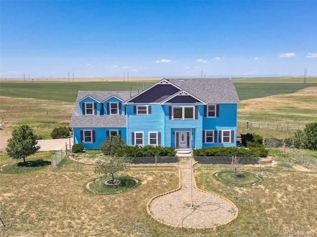 view of front of house featuring a rural view