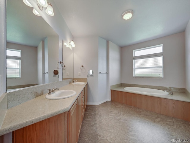 bathroom featuring vanity and a bathtub