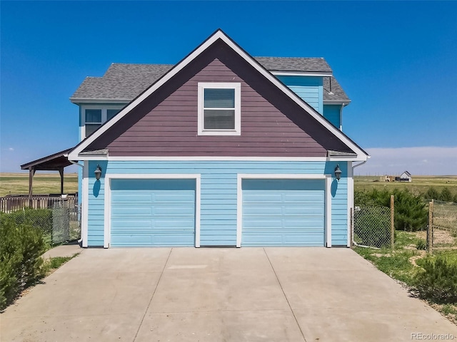 view of front of property featuring a garage