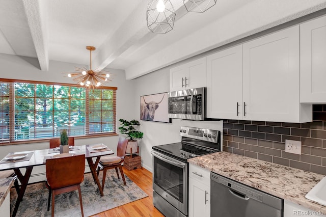 kitchen with decorative backsplash, beamed ceiling, white cabinets, and stainless steel appliances