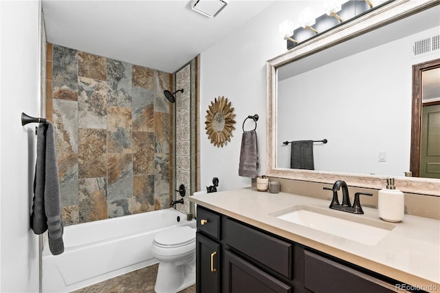 bathroom featuring shower / bath combination, vanity, visible vents, and toilet