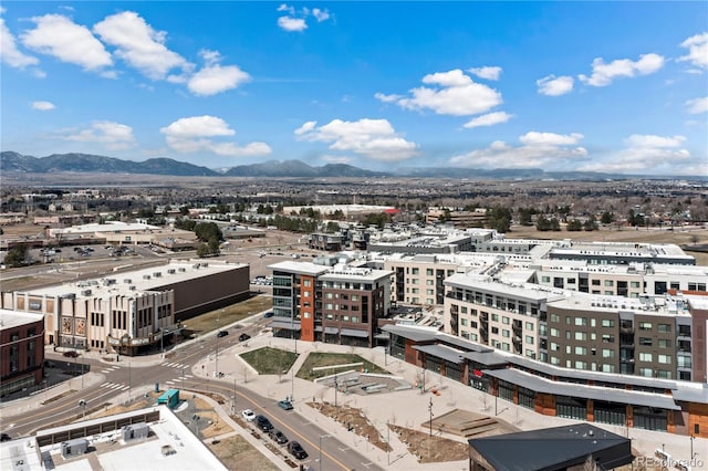 drone / aerial view featuring a mountain view