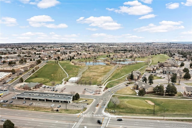 bird's eye view with a water view and a residential view