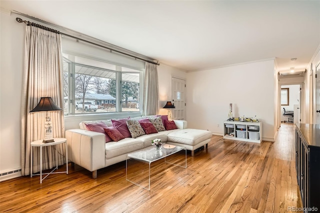 living room featuring light wood finished floors and baseboards