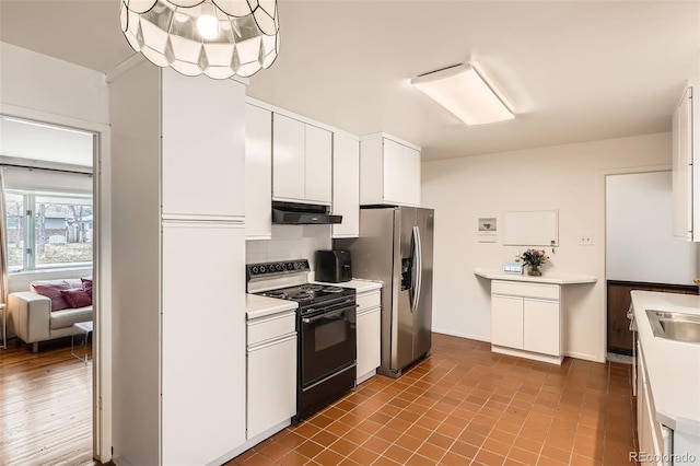 kitchen with stainless steel refrigerator with ice dispenser, light countertops, black range with electric stovetop, white cabinets, and under cabinet range hood