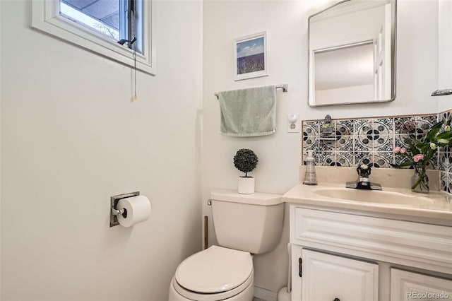 half bath with toilet and vanity