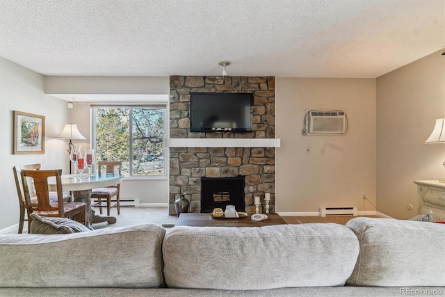 carpeted living area with a wall mounted air conditioner, a stone fireplace, baseboards, a baseboard radiator, and a baseboard heating unit