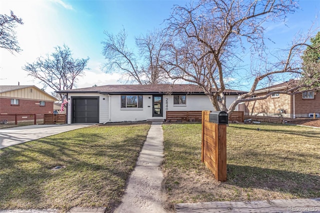 single story home with a front yard, an attached garage, fence, and driveway