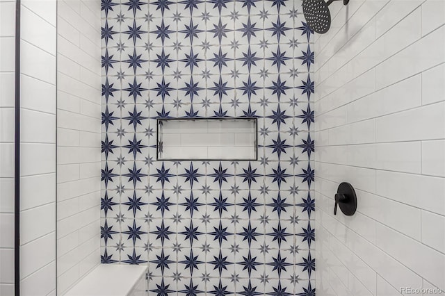 full bath featuring tiled shower