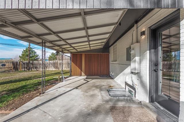 view of patio / terrace featuring a carport