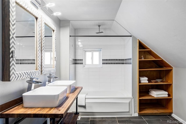 2731 California St, Denver, CO 80205 - bathroom featuring a combined bath / shower with rainfall shower, double vanity, and tile patterned flooring