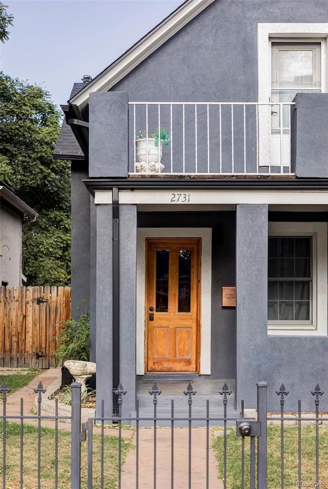2731 California St, Denver, CO 80205 - view of exterior entry featuring stucco siding