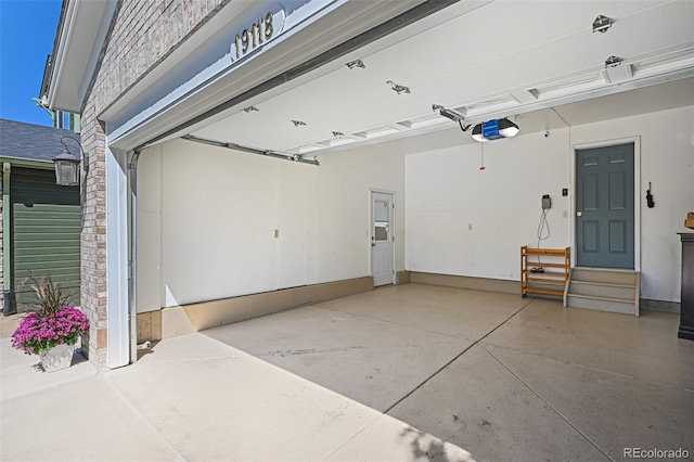 garage featuring a garage door opener