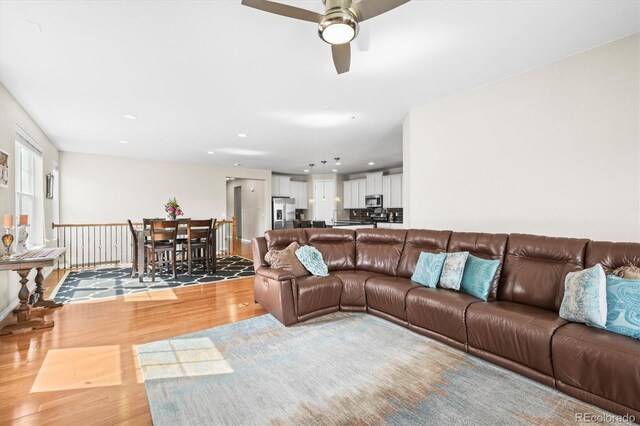 6174 Flattop St, Golden, CO 80403 - living area featuring light wood-style floors, ceiling fan, and recessed lighting