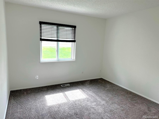 625 S Xenon Ct, Lakewood, CO 80228 - unfurnished room featuring carpet floors and a textured ceiling